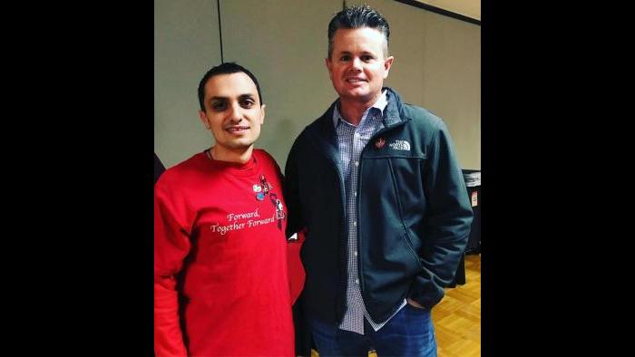 Patrick Korellis and the police officer who found him after the Feb. 14, 2008 shooting. (Courtesy of Patrick Korellis)