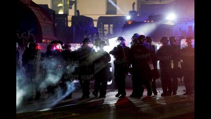 Authorities disperse protesters out of a park Tuesday, Aug. 25, 2020 in Kenosha, Wis. Anger over the Sunday shooting of Jacob Blake, a Black man, by police spilled into the streets for a third night. (AP Photo / Morry Gash)