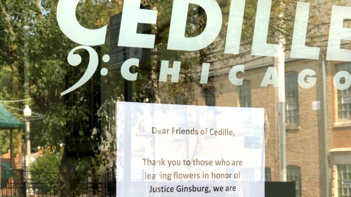A small memorial for Ruth Bader Ginsburg, outside the Edgewater offices of Cedille Records, owned by the son of the late Supreme Court justice. (Patty Wetli / WTTW News)