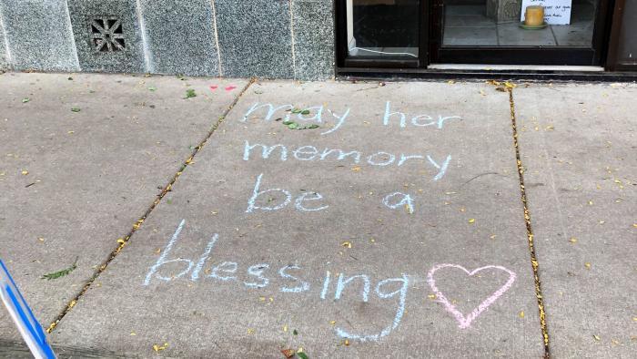 A small memorial for Ruth Bader Ginsburg, outside the Edgewater offices of Cedille Records, owned by the son of the late Supreme Court justice. (Patty Wetli / WTTW News)