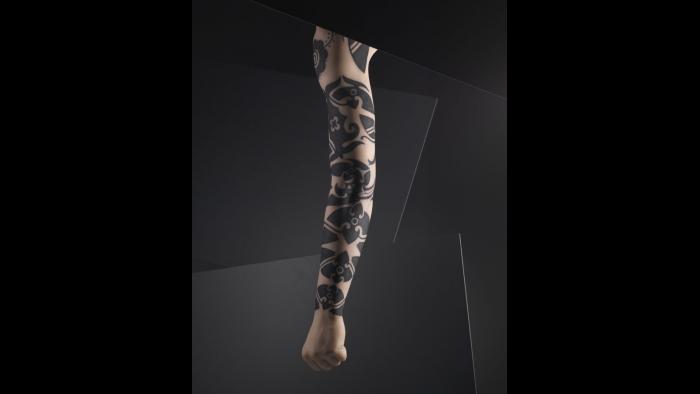 Silicone male arm with tattoo design by Ernesto Kalum, Borneo. (Courtesy of The Field Museum)