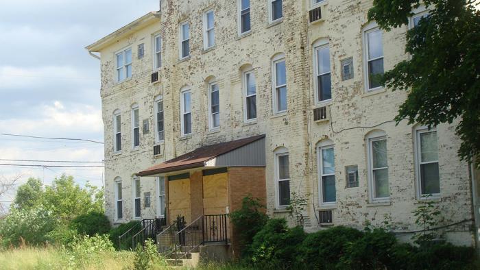 One of two tenement buildings that will be rehabilitated as part of a plan to build lofts in historic Pullman. (Mark Cassello)