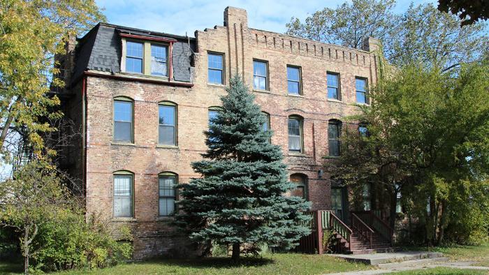 One of two tenement buildings that will be rehabilitated as part of a plan to build lofts in historic Pullman. (Mark Cassello)