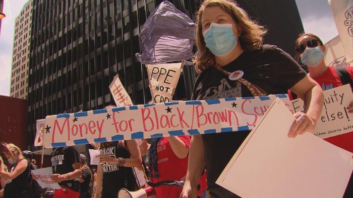 Demonstrators march in Chicago on Wednesday, June 24, 2020 to show their support for removing police officers from schools. (WTTW News)