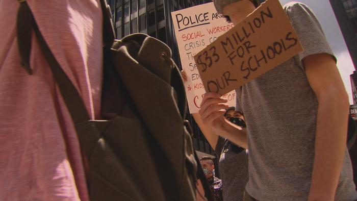 Demonstrators march in Chicago on Wednesday, June 24, 2020 to show their support for removing police officers from schools. (WTTW News)