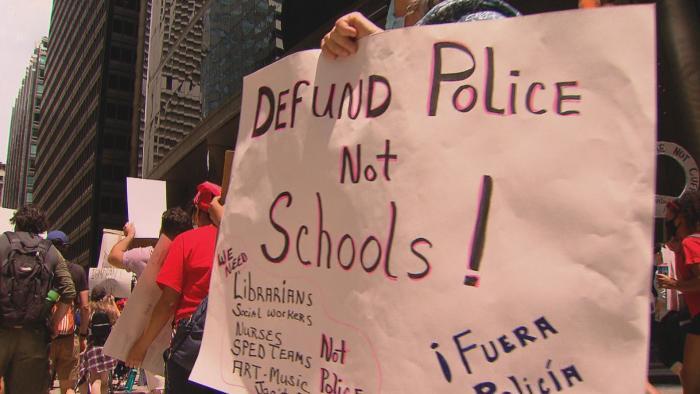 Demonstrators march in Chicago on Wednesday, June 24, 2020 to show their support for removing police officers from schools. (WTTW News)