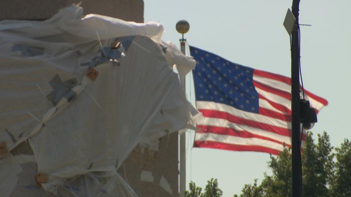 An empty pedestal in Grant Park where a statue of Christopher Columbus stood recently. (WTTW News)