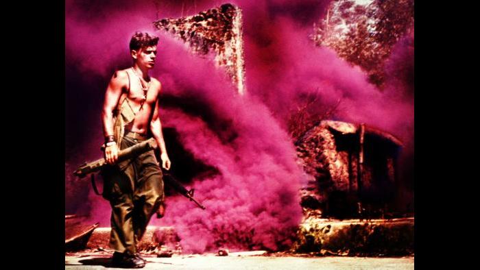 Rootin' Tootin' Raspberry, 1969. A member of the U.S. Army 101st Airborne Division sets smoke for a helicopter extraction near Tam Kỳ in the Quảng Tín Province. Photo by Captain Roger Hawkins, U.S. Army.