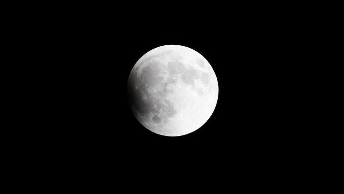 Photo by Michal Furmanek: The beginning of lunar eclipse over Lake Forest
