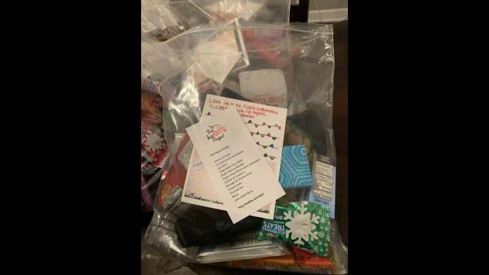 Each care package includes a handmade card and a list of its contents. (Photo: Monita Eng-Milton)