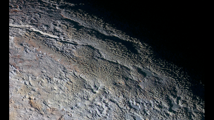 Pluto's strange "snakeskin" mountain landscape (Courtesy NASA/JHUAPL/SWRI)