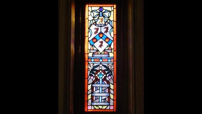 A stained glass window in the castle that has the Givins' family coat of arms. It is dedicated to his father, the Rev. Saltern Givins. (Credit: Michael Magidson)