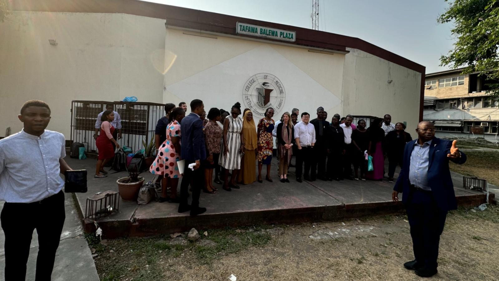 Northwestern University professor John Rogers, pictured here with his team in Nigeria, estimates that so far about 10,000 devices have been deployed that have been used to monitor some 30,000 infants in about 20 countries around the world. (Courtesy of John Rogers)