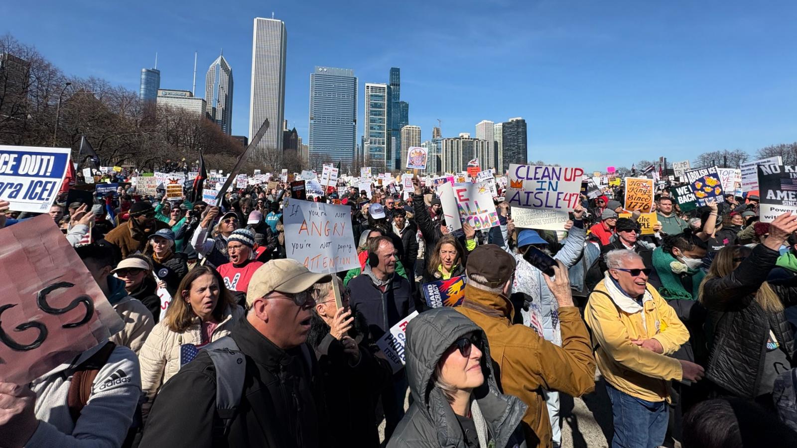 Thousands gather in Chicago’s Grant Park for a rally and march as part of the national “No Kings” protest on March 28, 2026. (Joel Ortiz / WTTW News)
