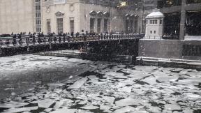 Pedestrians cross an icy Chicago River on Madison Street near the Civic Opera House on Monday, Jan. 28, 2019. (Rich Hein / Chicago Sun-Times via AP) Pedestrians cross an icy Chicago River on Madison Street near the Civic Opera House on Monday, Jan. 28, 2019. (Rich Hein / Chicago Sun-Times via AP)
