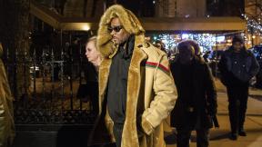R. Kelly walks to his vehicle after exiting a cigar lounge in Chicago on Monday, Feb. 25, 2019. A suburban Chicago woman posted the $100,000 bail for R. Kelly to be freed from jail while he awaits trial on sexual abuse charges. (Tyler LaRiviere / Chicago Sun-Times via AP) R. Kelly walks to his vehicle after exiting a cigar lounge in Chicago on Monday, Feb. 25, 2019. A suburban Chicago woman posted the $100,000 bail for R. Kelly to be freed from jail while he awaits trial on sexual abuse charges. (Tyler LaRiviere / Chicago Sun-Times via AP)