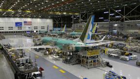 This Dec. 7, 2015, file photo shows the second Boeing 737 MAX airplane being built on the assembly line in Renton, Washington. (AP Photo / Ted S. Warren, File) This Dec. 7, 2015, file photo shows the second Boeing 737 MAX airplane being built on the assembly line in Renton, Washington. (AP Photo / Ted S. Warren, File)