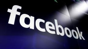 This March 29, 2018, file photo shows the Facebook moniker on screens at the Nasdaq MarketSite, in New York's Times Square. (AP Photo / Richard Drew, File) This March 29, 2018, file photo shows the Facebook moniker on screens at the Nasdaq MarketSite, in New York's Times Square. (AP Photo / Richard Drew, File)