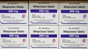 Boxes of the drug mifepristone sit on a shelf at the West Alabama Women's Center in Tuscaloosa, Ala., on March 16, 2022. (AP Photo/Allen G. Breed, File)