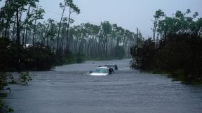 Cars sit submerged in water from Hurricane Dorian in Freeport, Bahamas on Tuesday, Sept. 3, 2019. (AP Photo / Ramon Espinosa) Cars sit submerged in water from Hurricane Dorian in Freeport, Bahamas on Tuesday, Sept. 3, 2019. (AP Photo / Ramon Espinosa)
