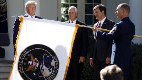 President Donald Trump watches with Vice President Mike Pence and Defense Secretary Mark Esper as the flag for U.S. Space Command is unfurled in the Rose Garden of the White House in Washington, D.C., on Thursday, Aug. 29, 2019. (AP Photo / Carolyn Kaster) President Donald Trump watches with Vice President Mike Pence and Defense Secretary Mark Esper as the flag for U.S. Space Command is unfurled in the Rose Garden of the White House in Washington, D.C., on Thursday, Aug. 29, 2019. (AP Photo / Carolyn Kaster)