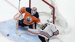 Edmonton Oilers goalie Mikko Koskinen (19) makes a save against Chicago Blackhawks’ Dominik Kubalik (8) during third-period NHL hockey Stanley Cup playoff game action in Edmonton, Alberta, Saturday, Aug. 1, 2020. (Jason Franson / The Canadian Press via AP) Edmonton Oilers goalie Mikko Koskinen (19) makes a save against Chicago Blackhawks’ Dominik Kubalik (8) during third-period NHL hockey Stanley Cup playoff game action in Edmonton, Alberta, Saturday, Aug. 1, 2020. (Jason Franson / The Canadian Press via AP)