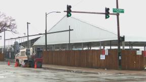 Work is underway at a base camp for migrants in Brighton Park on Dec. 1, 2023. (WTTW News) Work is underway at a base camp for migrants in Brighton Park on Dec. 1, 2023. (WTTW News)