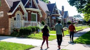 Residents walk down a block in the Chatham community. (Provided by the Chicago Community Trust)