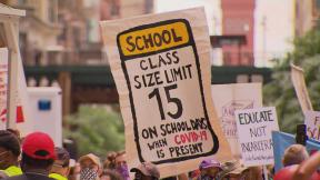 Demonstrators march in Chicago on Wednesday, June 24, 2020 to show their support for removing police officers from schools. (WTTW News) Demonstrators march in Chicago on Wednesday, June 24, 2020 to show their support for removing police officers from schools. (WTTW News)