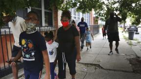 St. Francis Xavier School students and their families walk together in Newark, on Thursday, Aug. 6, 2020, after discussing the Catholic school's permanent closure announced the previous week by the Archdiocese of Newark. Nationwide, more than 140 Catholic schools will not reopen in the fall. (AP Photo/Jessie Wardarski) St. Francis Xavier School students and their families walk together in Newark, on Thursday, Aug. 6, 2020, after discussing the Catholic school's permanent closure announced the previous week by the Archdiocese of Newark. Nationwide, more than 140 Catholic schools will not reopen in the fall. (AP Photo/Jessie Wardarski)