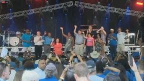 Gov. J.B. Pritzker and other state Democrats wave to the crowd at the Illinois State Fair’s Democrat Day on Aug. 17, 2022. (WTTW News) Gov. J.B. Pritzker and other state Democrats wave to the crowd at the Illinois State Fair’s Democrat Day on Aug. 17, 2022. (WTTW News)