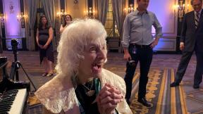 Pianist Dorothy Olson Pauletti reacts to receiving a lifetime achievement award from the Chicago Federation of Musicians. Pianist Dorothy Olson Pauletti reacts to receiving a lifetime achievement award from the Chicago Federation of Musicians.