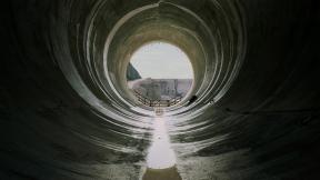 In a photograph titled “West Bull Nose,” Brad Temkin depicts one of the exits of Chicago’s Deep Tunnel. (Brad Temkin / The Field Museum) In a photograph titled “West Bull Nose,” Brad Temkin depicts one of the exits of Chicago’s Deep Tunnel. (Brad Temkin / The Field Museum)