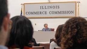 Illinois Commerce Commission Chair Doug Scott presides over a commission meeting in Chicago in late January. (Andrew Adams / Capitol News Illinois) 