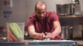 Anthony Irons in Shattered Globe Theatre’s Chicago premiere of “How to Use a Knife.” (Photo by Michael Brosilow) Anthony Irons in Shattered Globe Theatre’s Chicago premiere of “How to Use a Knife.” (Photo by Michael Brosilow)