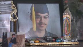 A photo of Kobe Puga on display in his mother’s home. (WTTW News)