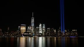 In this Sept. 11, 2017, file photo, the Tribute in Light illuminates in the sky above the Lower Manhattan area of New York, as seen from across the Hudson River in Jersey City, N.J. (AP Photo / Jason DeCrow, File) In this Sept. 11, 2017, file photo, the Tribute in Light illuminates in the sky above the Lower Manhattan area of New York, as seen from across the Hudson River in Jersey City, N.J. (AP Photo / Jason DeCrow, File)