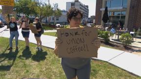 A Starbucks worker in Edgewater participates in a one-day strike on Aug. 30, 2022. (WTTW News) A Starbucks worker in Edgewater participates in a one-day strike on Aug. 30, 2022. (WTTW News)