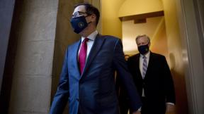 Treasury Secretary Steven Mnuchin, left, and White House Chief of Staff Mark Meadows, right, walk to speak to reporters after meeting with House Speaker Nancy Pelosi of Calif. and Senate Minority Leader Sen. Chuck Schumer of N.Y. as they continue to negotiate a coronavirus relief package on Capitol Hill in Washington, Friday, Aug. 7, 2020. (AP Photo/Andrew Harnik) Treasury Secretary Steven Mnuchin, left, and White House Chief of Staff Mark Meadows, right, walk to speak to reporters after meeting with House Speaker Nancy Pelosi of Calif. and Senate Minority Leader Sen. Chuck Schumer of N.Y. as they continue to negotiate a coronavirus relief package on Capitol Hill in Washington, Friday, Aug. 7, 2020. (AP Photo/Andrew Harnik)