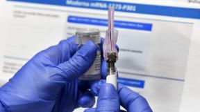 In this Monday, July 27, 2020 file photo, a nurse prepares a shot as a study of a possible COVID-19 vaccine, developed by the National Institutes of Health and Moderna Inc., gets underway in Binghamton, N.Y. (AP Photo / Hans Pennink) In this Monday, July 27, 2020 file photo, a nurse prepares a shot as a study of a possible COVID-19 vaccine, developed by the National Institutes of Health and Moderna Inc., gets underway in Binghamton, N.Y. (AP Photo / Hans Pennink)