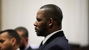R. Kelly appears at a hearing Tuesday, May 7, 2019 before Judge Lawrence Flood at the Leighton Criminal Court Building in Chicago. (E. Jason Wambsgans / Chicago Tribune / Pool) R. Kelly appears at a hearing Tuesday, May 7, 2019 before Judge Lawrence Flood at the Leighton Criminal Court Building in Chicago. (E. Jason Wambsgans / Chicago Tribune / Pool)